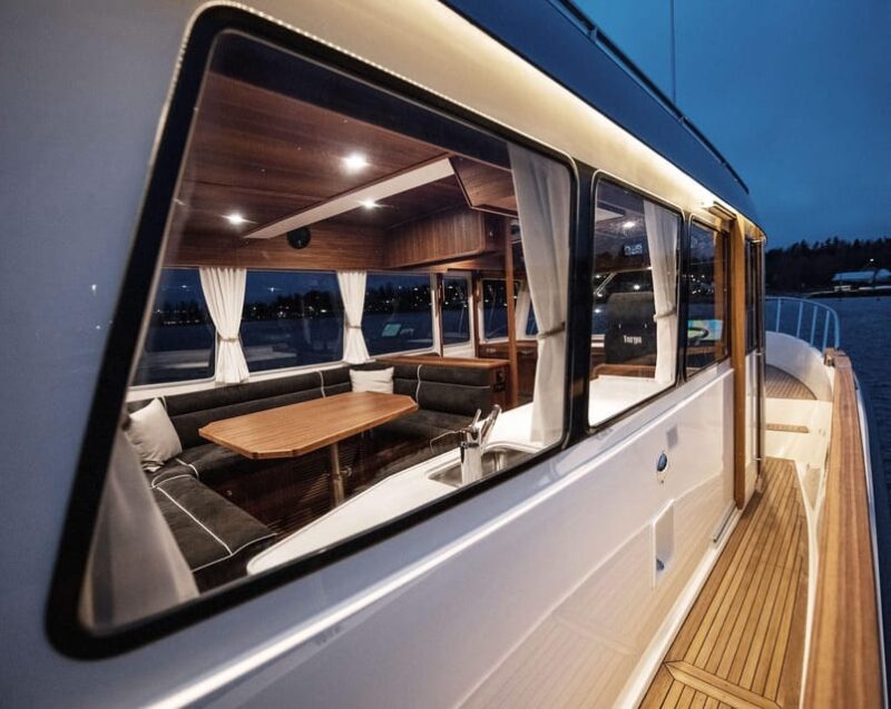 Santorini: Private Motor Yacht Cruise with Meal & Open Bar - Passing by the Akrotiri Lighthouse and Indian Rock