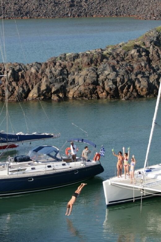 Santorini: Private Sailing Yacht Cruise with Meal & Drinks - Explore Santorini from the Deck of a Private Sailing Yacht