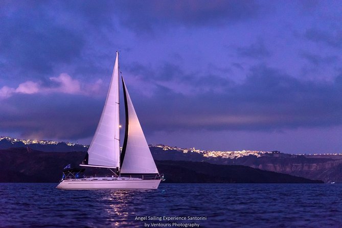 Santorini Private Sunset Sailing Tour with Dinner, Drinks &Transfer included - Navigating Santorini’s Iconic Beaches: Red Beach and White Beach