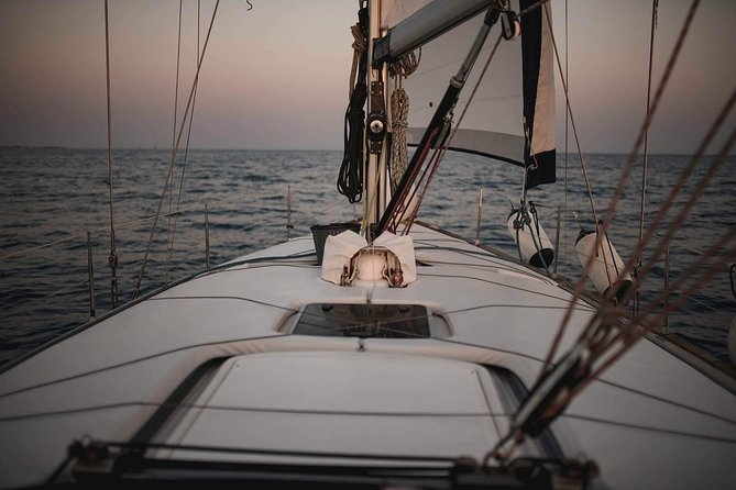 Santorini Private Sunset Sailing Tour with Dinner, Drinks &Transfer included - Approaching Palea Kameni and the Volcanic Hot Springs