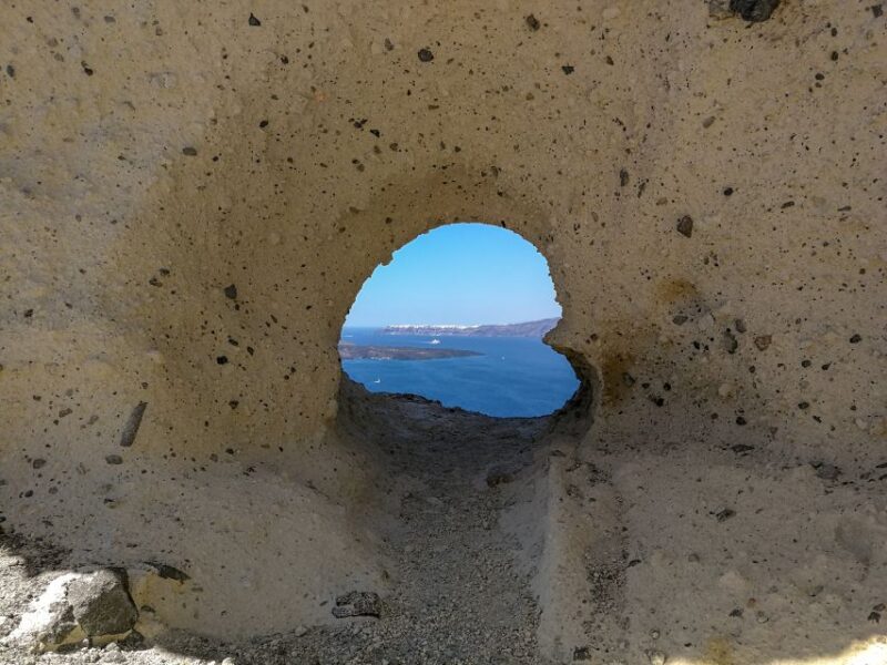 Santorini: Private Sunset Tour with Wine Tasting and Dinner - Exploring Saint Nicholas Chapel and the Clifftop Views