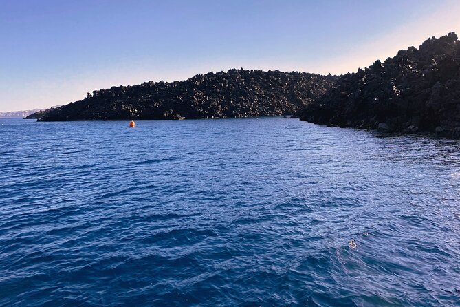 Santorini Sailsational: The Ultimate Caldera Sunset Cruise - Swimming and Snorkeling in Mesa Pigadia Bay