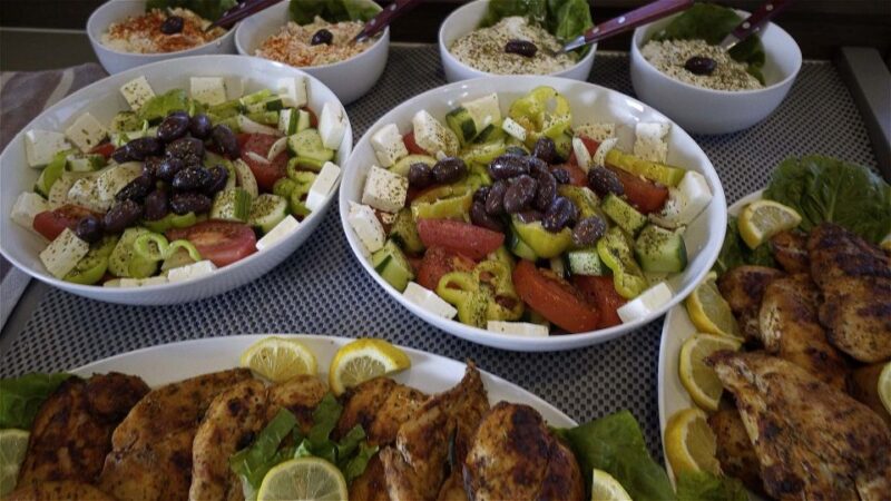 Santorini: Sunset Cruise with Greek Dinner and Transfer - Key Points