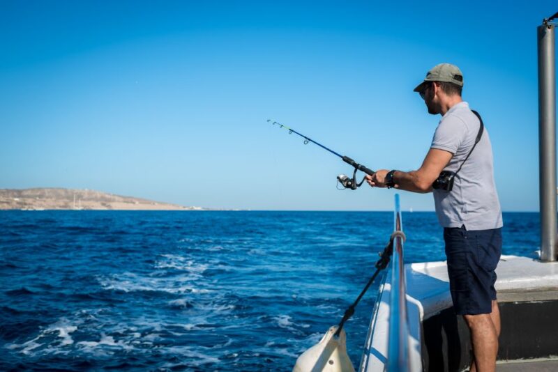 Santorini Sunset Fishing Trip with Dinner and Drinks - The Traditional Fishing Experience and Marine Life Encounters