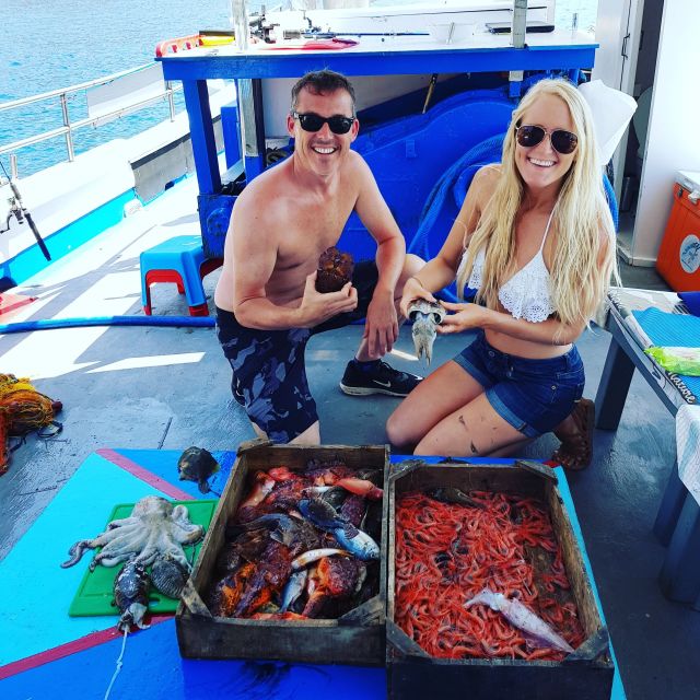 Santorini Sunset Fishing Trip with Dinner and Drinks - The Experience of a Small, Personal Group