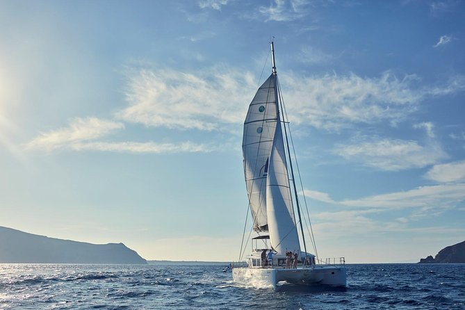 Santorini Sunset Luxury Sailing Catamaran Cruise with BBQ, drinks, transfer - Snorkeling and Water Activities