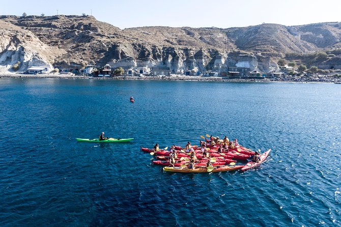 Santorini: Sunset Sea Kayak with Light Dinner - The Sunset Experience: Watching Nature’s Canvas from the Water
