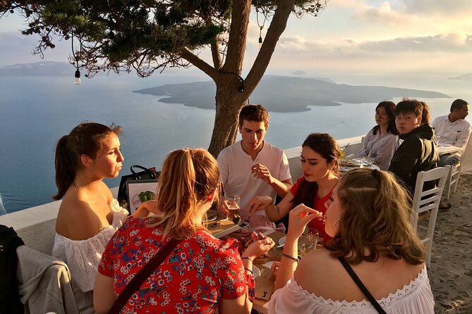 Santorini Sunset Walking Tour inc. tastings and 5 drinks - Key Points