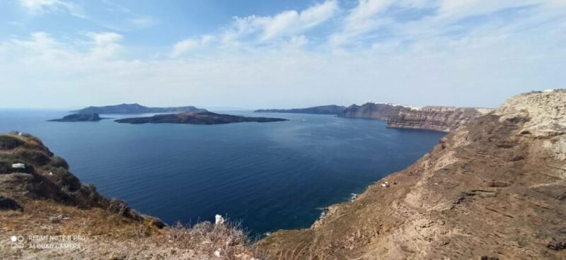 Santorini Unveiled: 4-Hour Discovery - Relaxing at Perissa Beach