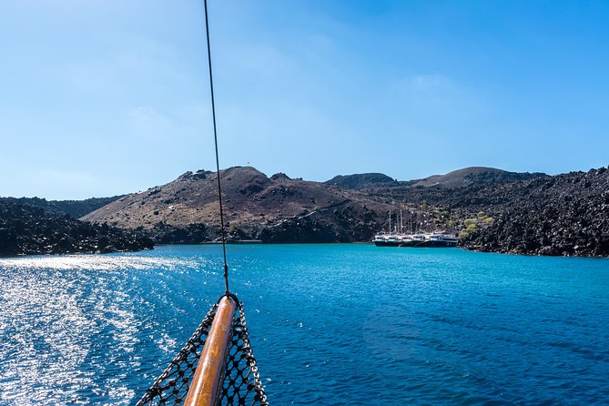 Santorini Volcano and Hot Springs Cruise Tour from Fira Old Port - Relaxing at Palea Kameni’s Natural Hot Springs