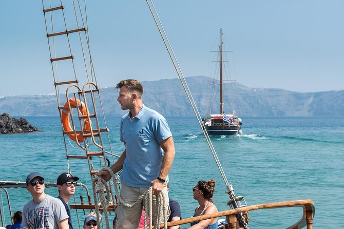 Santorini Volcano Sunset Cruise with Dinner - Watching the Sunset near Oia: A Magical Moment