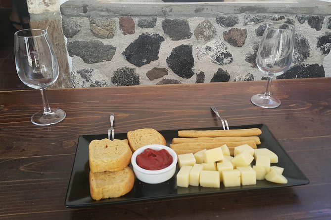 Santorini Wine Tasting & Food Pairing :Taste good life at Santorini - Walking Tour Through Pyrgos and Its UNESCO Hilltop Castle