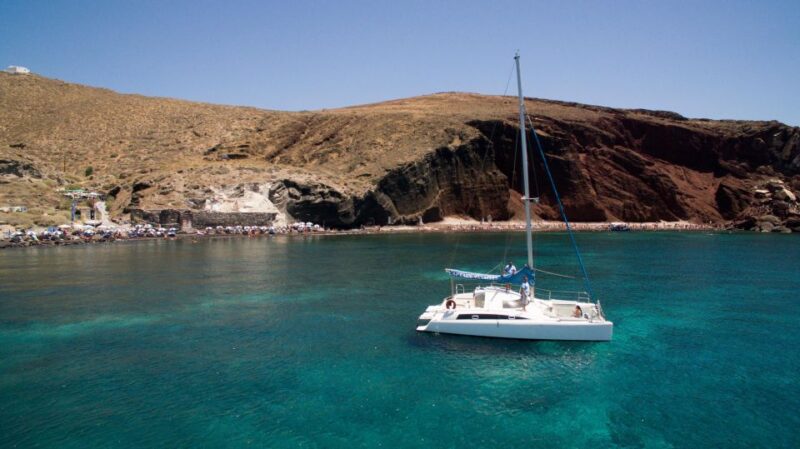 Santorini:Catamaran: private cruise with food & drinks - Discover Santorini’s Hidden Beaches on a Private Catamaran