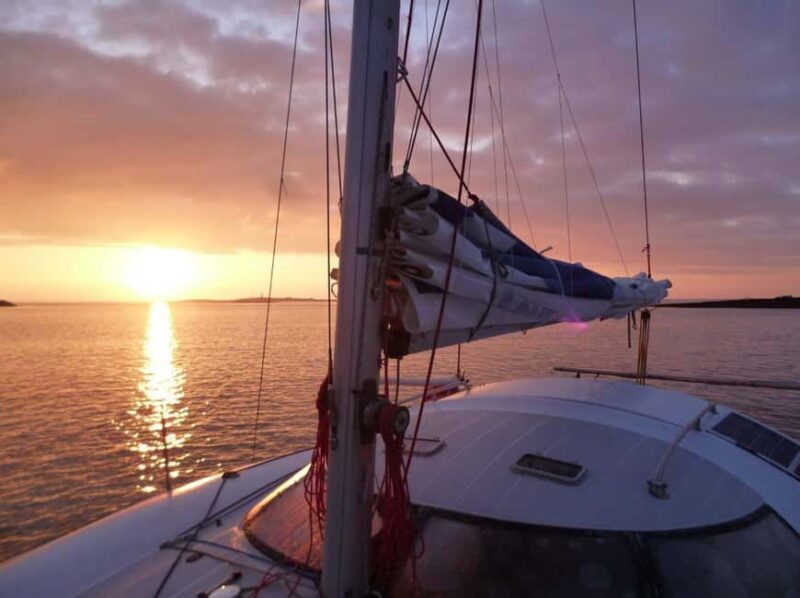 Santorini:Catamaran: private cruise with food & drinks - Onboard Greek Buffet and Refreshing Drinks