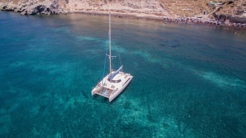 Santorini:Catamaran: private cruise with food & drinks - Flexibility and Cancellation Policy