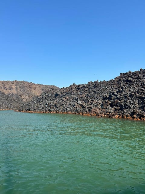 Santorini:Cruises with Catamaran around the Volcanic Island. - Swim in the Volcanic Thermal Springs Between Nea and Palaia Kameni