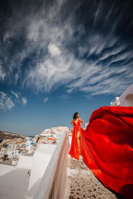 Santorini:Flying Dress shoot with Professional photographer - The Role of the Assistant in Creating Beautiful Flying Dress Photos
