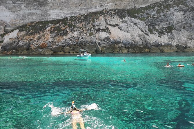 SciatumiaDay boat tour to Lampedusa with typical lunch - Cala Pulcino: Snorkeling in Clear Waters