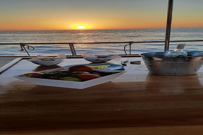 Sea Sunset Tour in the Bay of Naousa - Paros - Tasting Local Wines and Snacks on Board