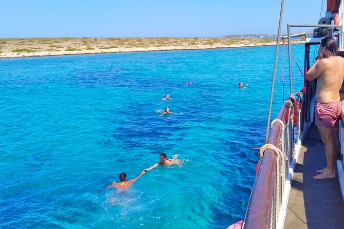 Sea Tour Blue Lagoon , Southern Paros Full day -port Alyki - Parian Cuisine: A Delicious Lunch on Board