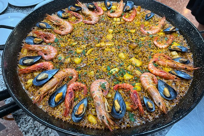 Seafood paella cooking class, tapas and visit to Ruzafa market. - The Cultural Insights from Guides