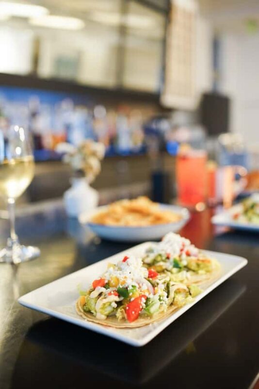 Seattle: Pike Place from Market to Table - Meet Your Guide Outside Seleus Chocolates