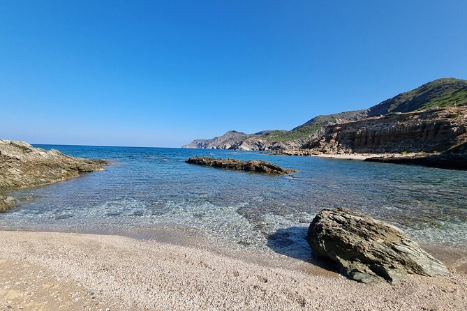 Secret Beaches and Coastal Tour by Land - Palmadula: Cliffs and Clear Waters