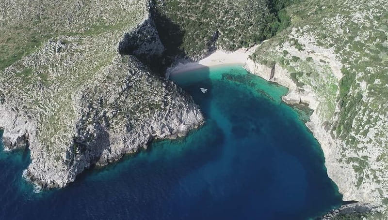 Secret Blue Cave & Grama Bay - Speed Boat Tour - Llovizi Bay and the Blue Cave: One of the Most Beautiful Beaches
