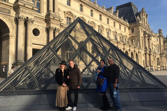See 15+ Top Sights Paris Tour with Fun Guide, (Walking and Metro Tour) - The Louvre Museum’s Iconic Pyramid and Surroundings