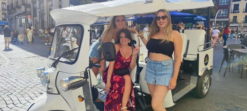 "See Madrid Differently: A Premium Private Tuk Tuk Ride" - Highlighting Madrid’s Architectural Marvels: Alcala Gate and Arab Wall