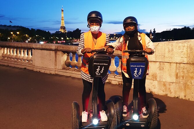 Segway by night ! Illuminated Paris - The Experience in Rain and Cold Weather