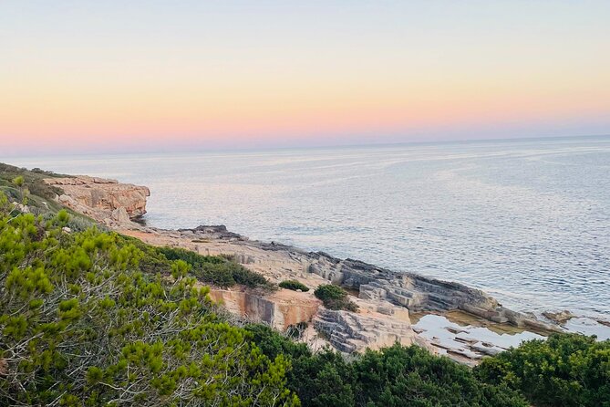 Self-guided Walking Tour and Outdoor Escape Game in Cala Millor, in German - Key Points