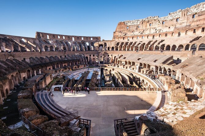 Semi Private Colosseum & Ancient Rome Walking Tour - Walking Through the Roman Forums Ruins