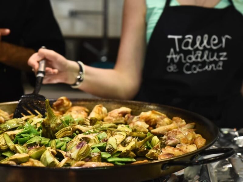 Seville: 3.5-Hour Spanish Cooking Class & Triana Market Tour - Inside the Cooking School: Making Classic Spanish Dishes