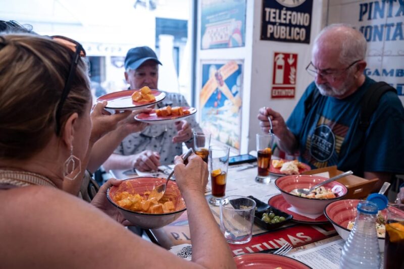 Seville Adventure: Historic Walking Tour & Traditional Tapas - Key Points