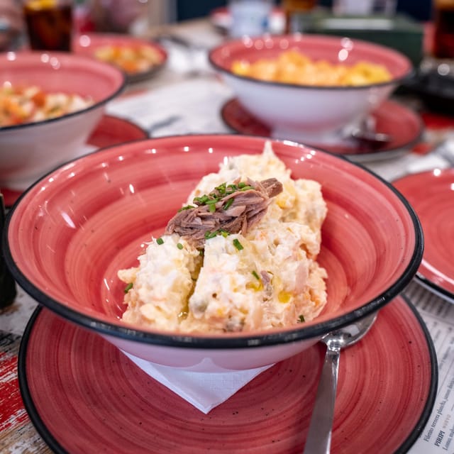 Seville Adventure: Historic Walking Tour & Traditional Tapas - Authentic Tapas Experience at a Local Restaurant