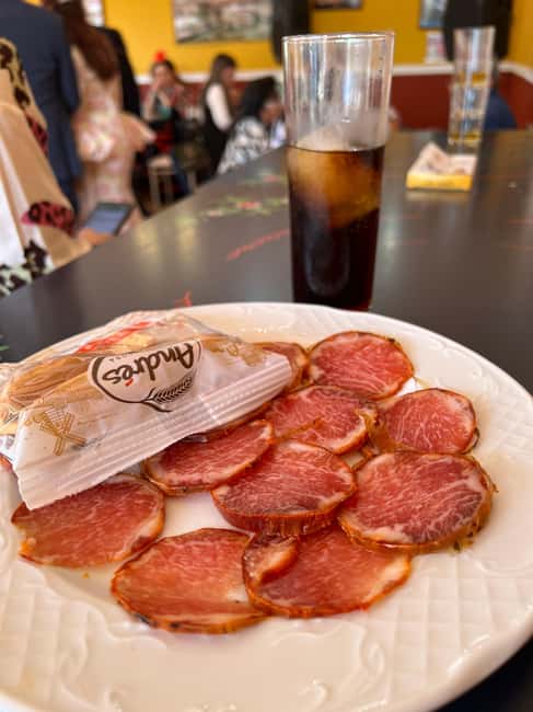 Seville: April Fair Guided Walking Tour with Tapas & Drinks - Understanding the Value and Limitations