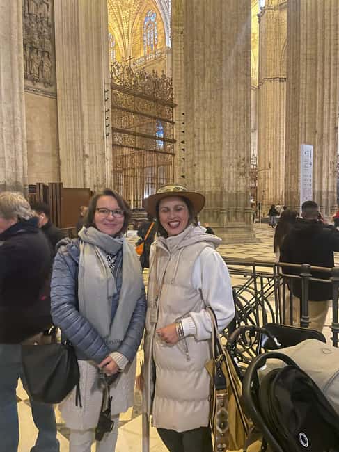 Seville: Cathedral & Giralda Priority Access guided tour - Climbing the Giralda Tower for Stunning City Views