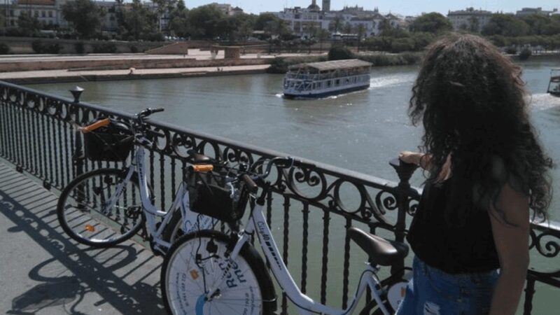 Seville City Bike Tour: Top Seville's Monuments - Crossing into Triana and Visiting the Setas de Sevilla
