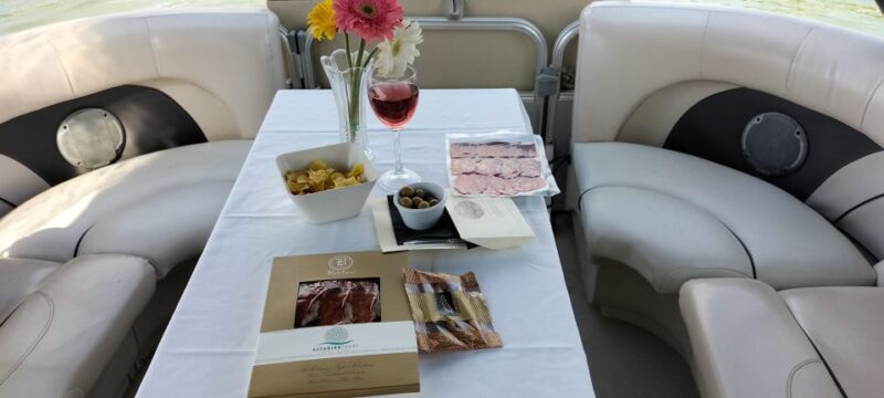 Seville: Exclusive River Boat Tour with Tapas - Highlights of the Onboard Experience