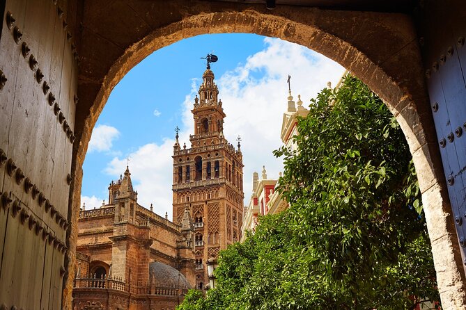 Seville Guided Small-Group Walking Tour - Significance of Puerta de Jerez and the Largest Wooden Structure