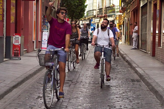 Seville Highlights Bike Tour (English) - Discovering the Vibrant Triana Neighborhood