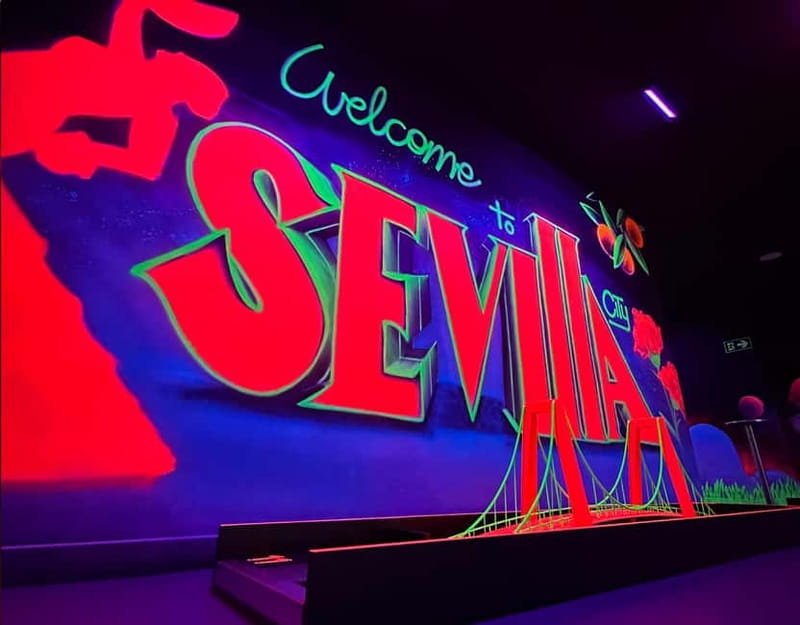 Seville: Indoor UV 18 hole Minigolf Experience - All-Inclusive Game with UV Equipment for Every Player
