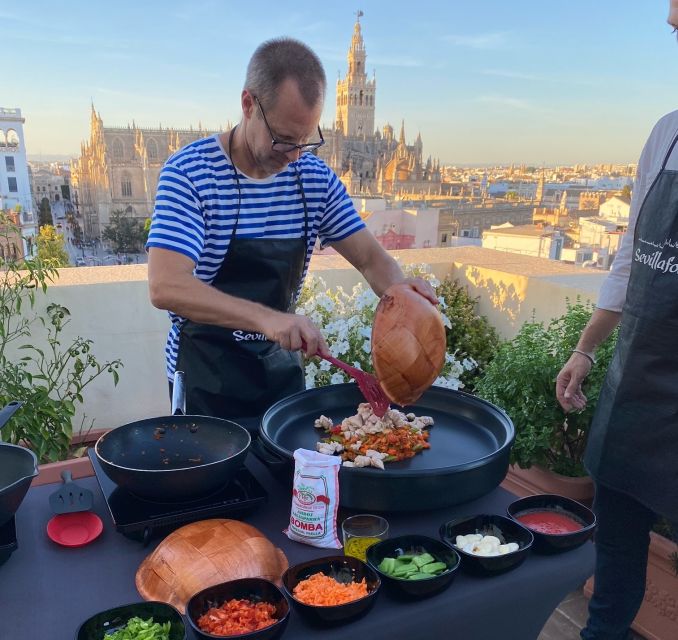 Seville: Paella Cooking Class & 30-Min Local Expert Q&A - Discover a Unique Rooftop Paella Cooking Experience in Seville