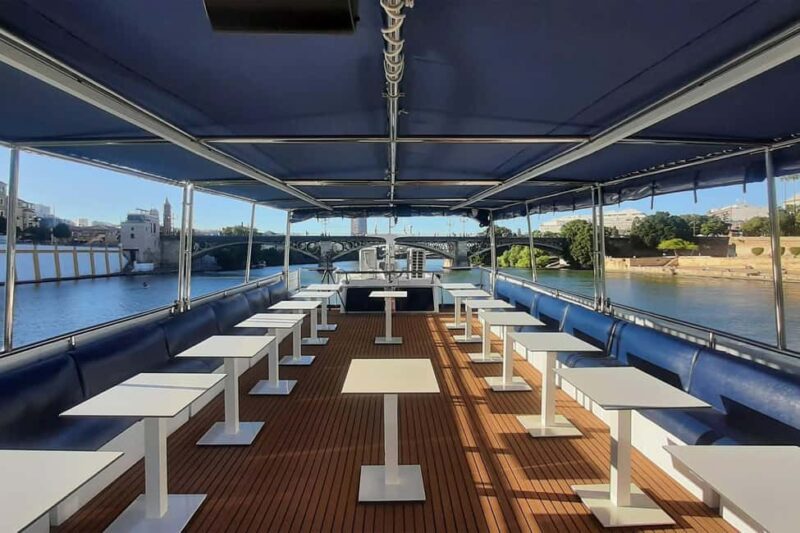 Seville: Restaurant Boat Ride on the Guadalquivir with Lunch/Dinner - The Scenic Route on the Guadalquivir River