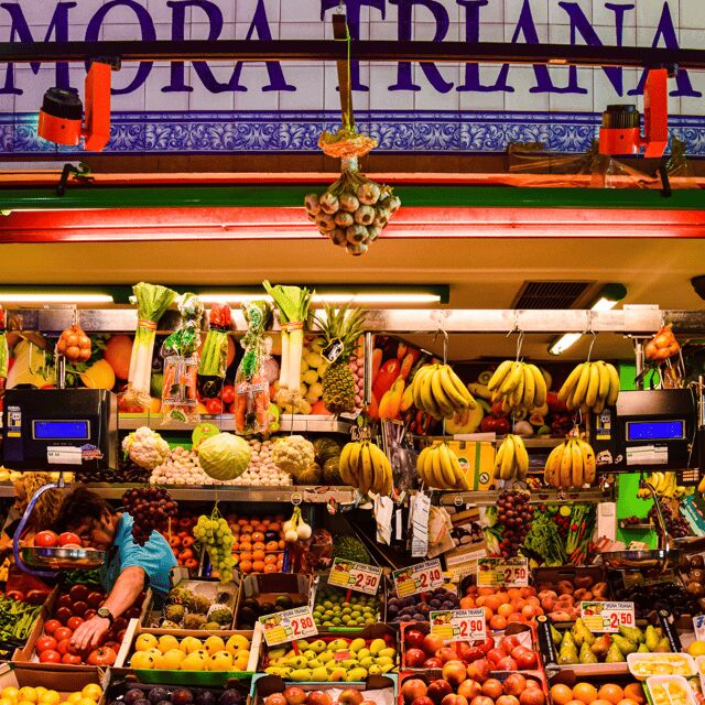 Seville: Tiny-Group Triana Iconic Neighborhood Walking Tour - Key Points