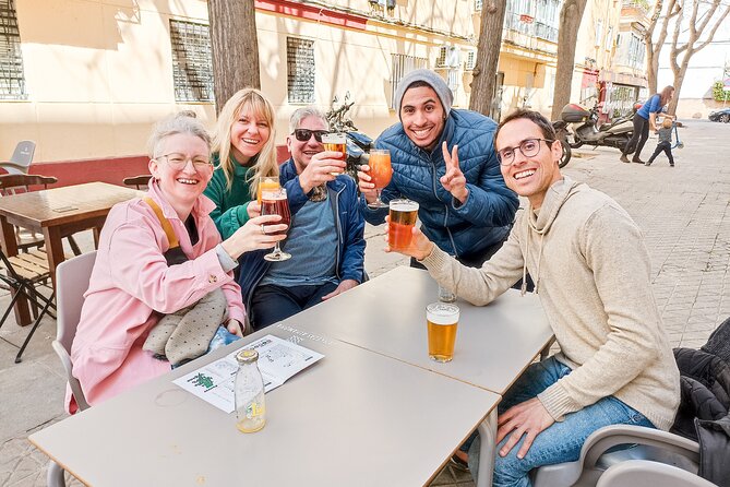 Seville Vegan Tapas Food and Market Walking Tour - Triana Neighborhood: Home of Flamenco and Traditional Life