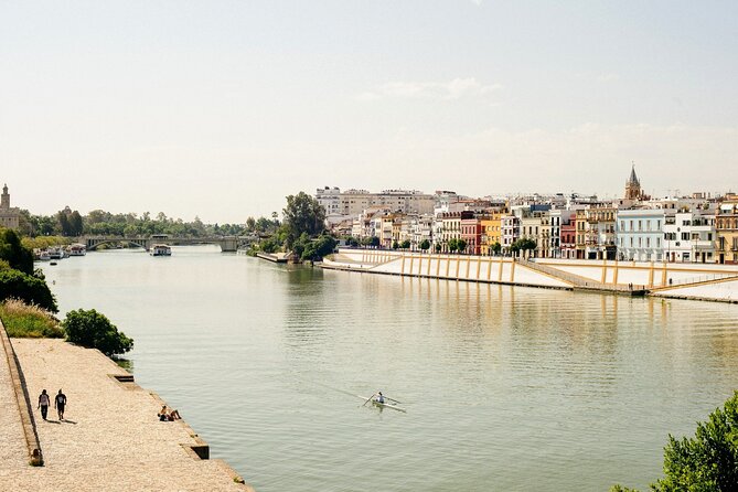 Seville's Triana Neighborhood Tapas & Wine Tour - Key Points