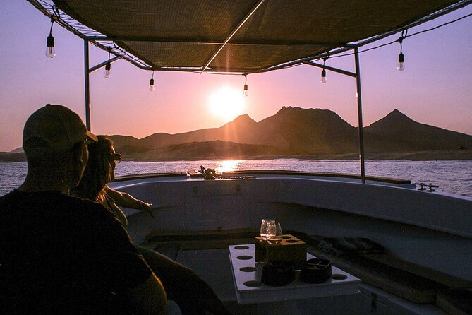 Shared Cabo Sunset Cruise with Open Bar and Scenic Views - Capture the Moment with Free Professional Photos