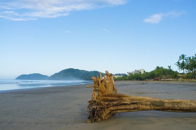 Shuttle From San Jose Airport To Jaco Beach or From Jaco Beach - Direct Pickup in San Joses Arrivals Hall with a Sign